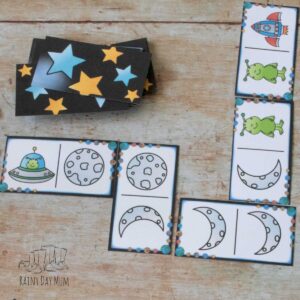 space themed picture domino game set out on a table ready to play with your preschoolers